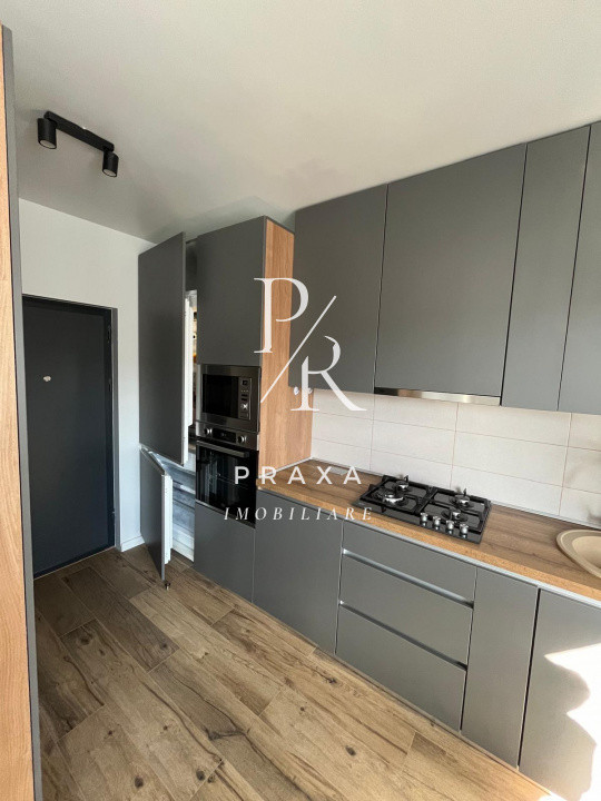 Apartament de inchiriat 2 camere,terasa de 50 mp si parcare subterana!